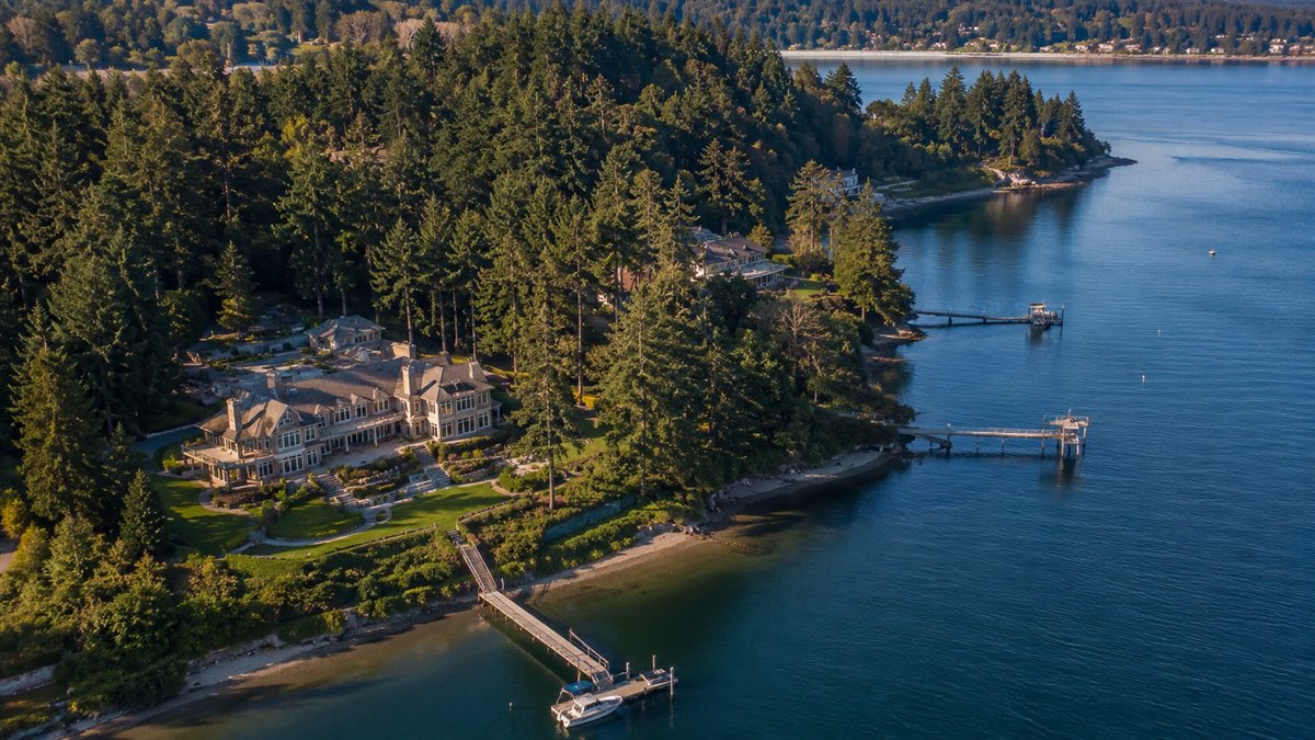 Aerial photo of forested waterfront estates on Bainbridge Island