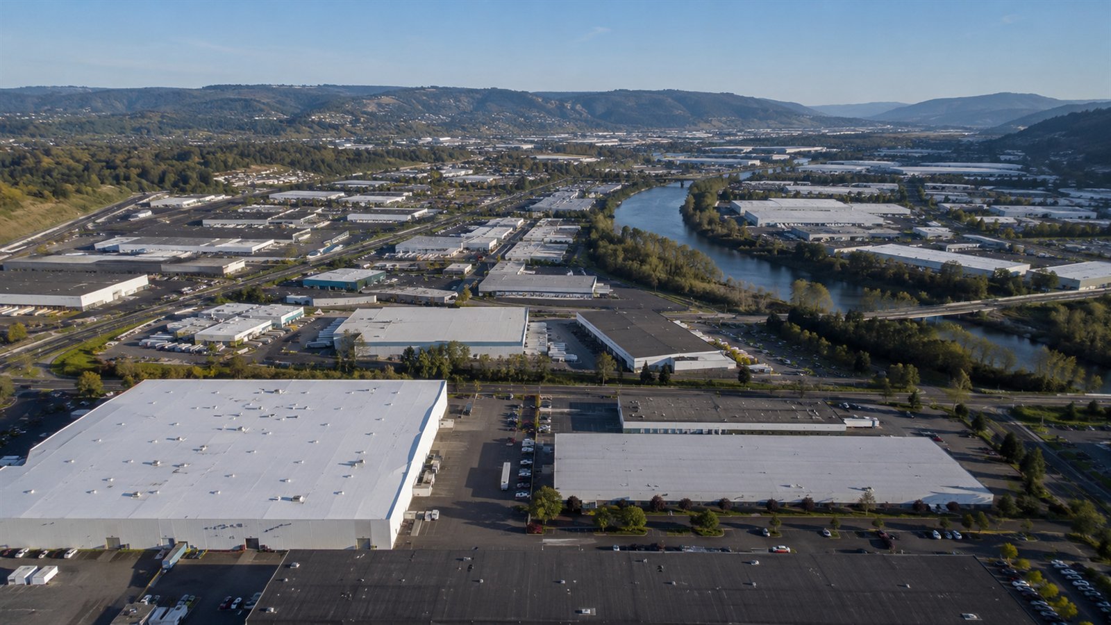 Aerial drone view of the Kent Valley with warehouses and the Green River