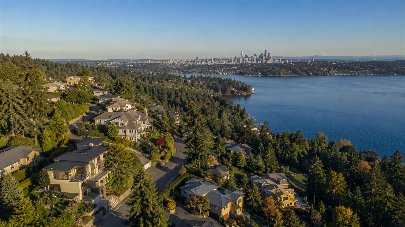 Aerial drone view of hillside Newcastle with Lake Washington and the Seattle skyline beyond
