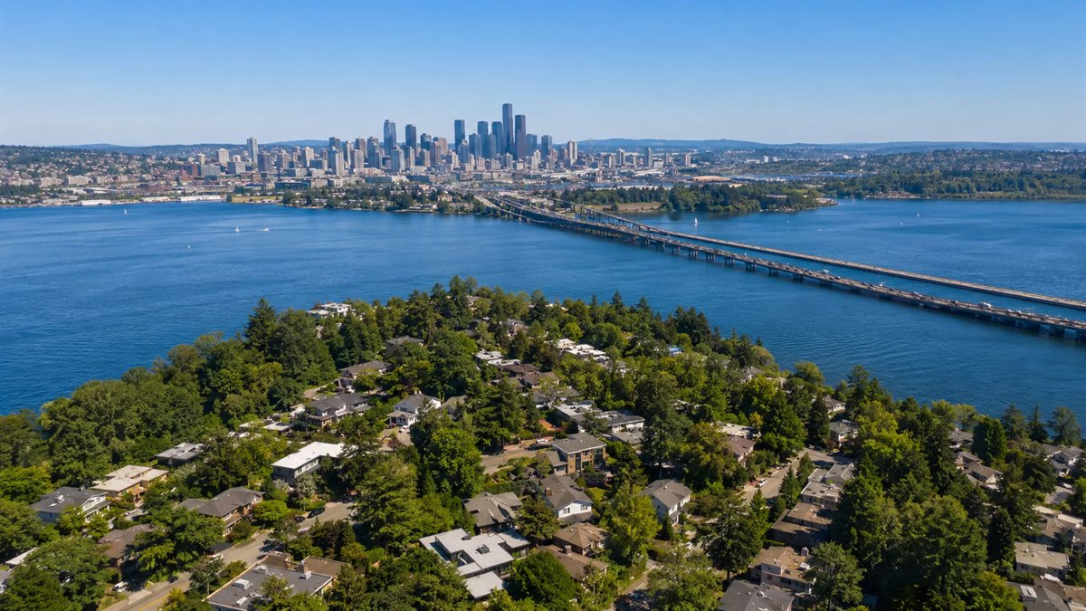 Aerial photo of Mercer Island with the Seattle skyline and I-90 bridges